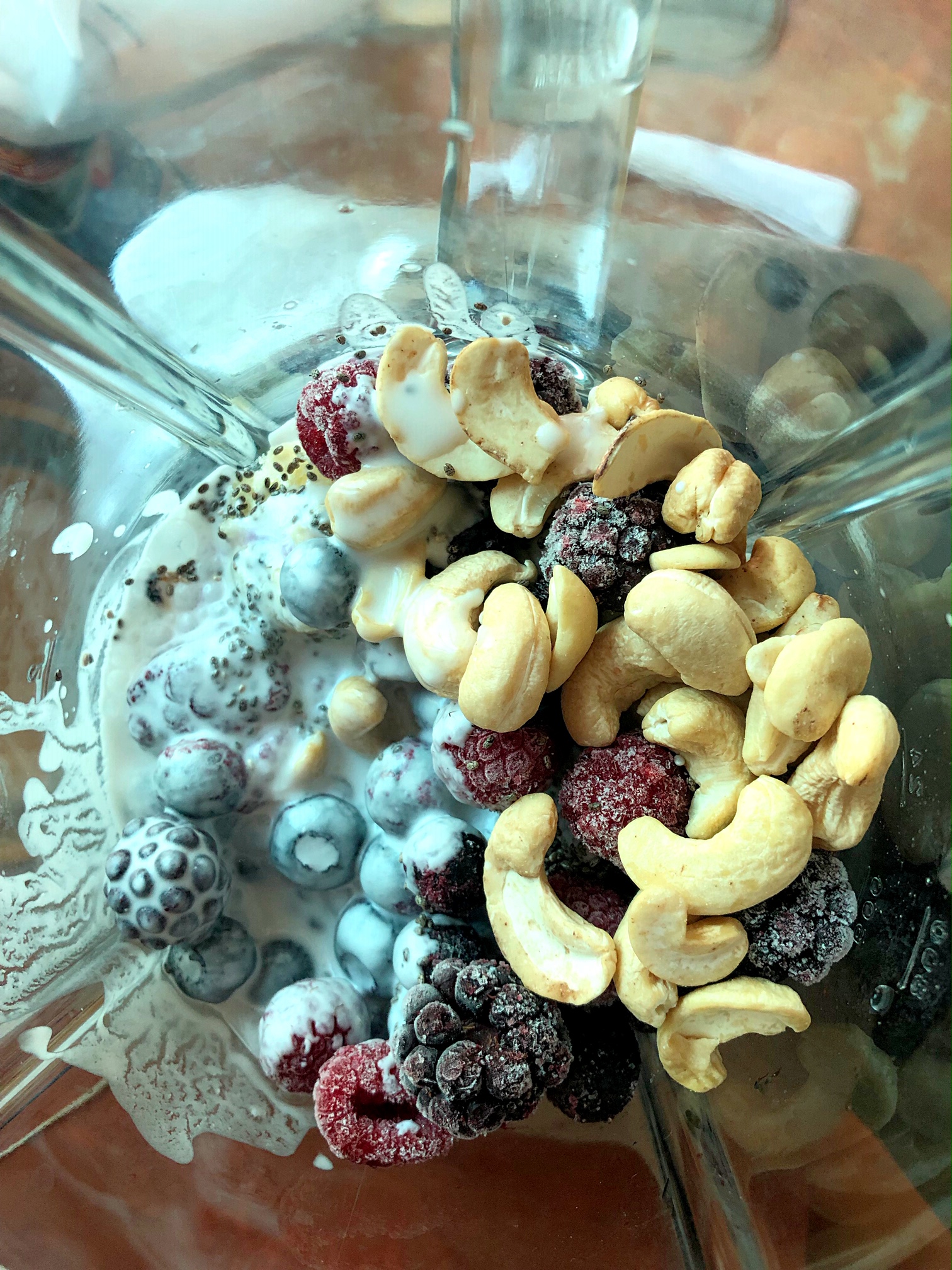 Berry, Cashew, Coconut Smoothie Bowl; The perfect breakfast on a hot Summer's morning.